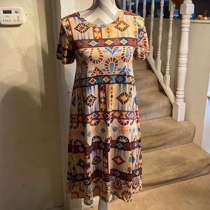 XS Lularoe Carly Hi Lo swing dress-tan bkgrd with dark brown, black & teal Aztec
